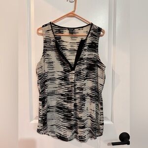 Stoosh brand women’s sleeveless blouse, black and white lines size large.